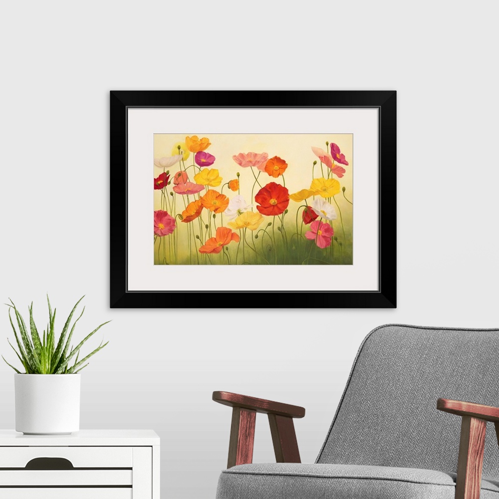 A modern room featuring A contemporary painting of a group multi-colored poppy flowers in green grass.