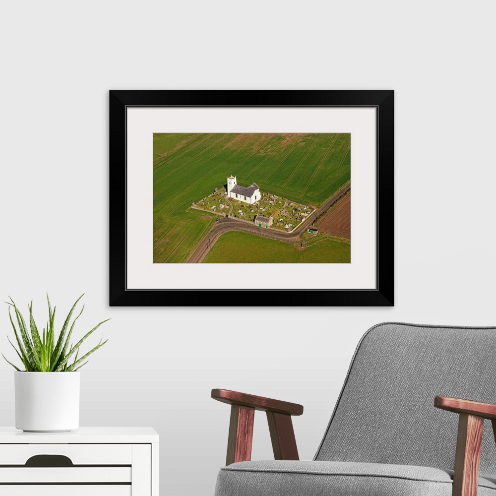 A modern room featuring Ballintoy Parish Church, Bushmills, Northern Ireland - Aerial Photograph