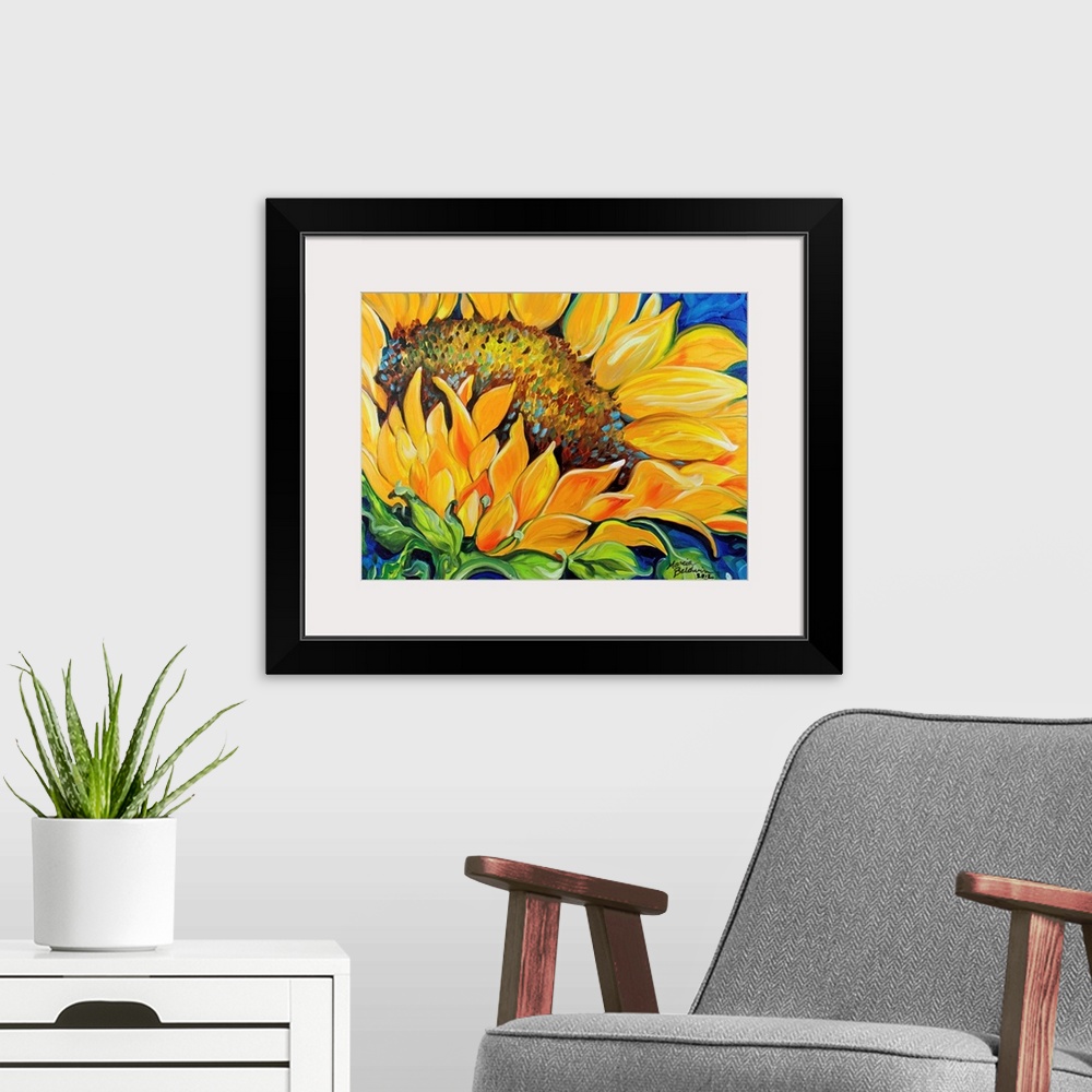A modern room featuring Contemporary painting of a sunflower up close on a blue background.