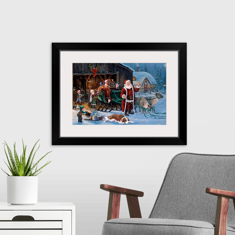 A modern room featuring Large, horizontal wall picture of Santa Claus standing in front of his sleigh while elves load it...