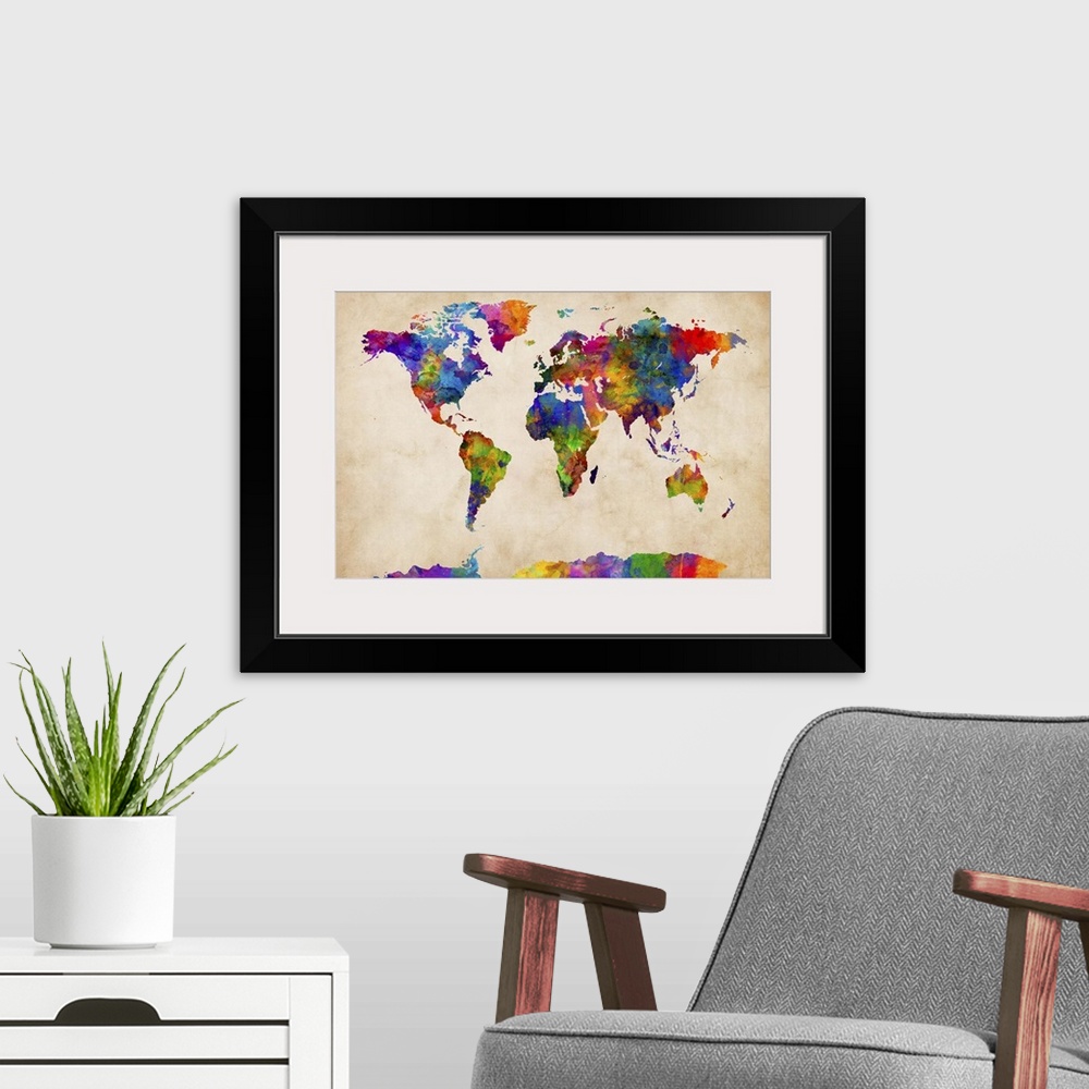 A modern room featuring Contemporary colorful paint splash world map artwork.