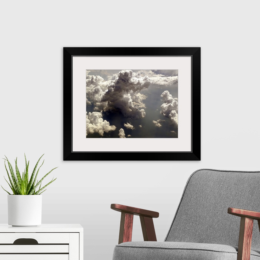 A modern room featuring flying over clouds