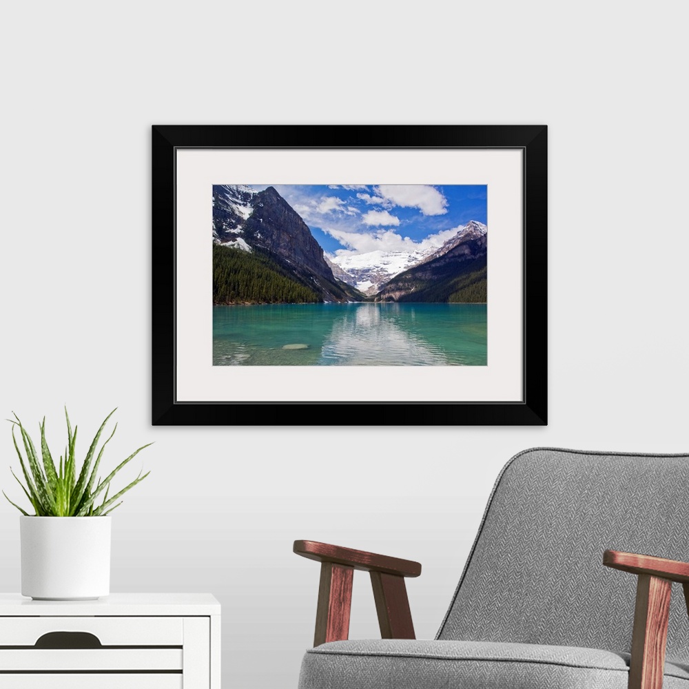 A modern room featuring Clear, clean water and majestic mountain scenery at Lake Louise.