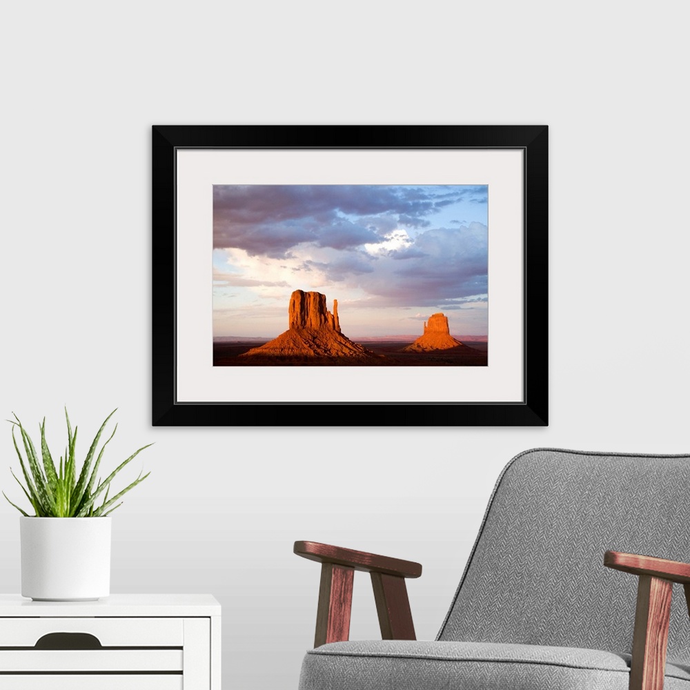A modern room featuring East and West Mitten Buttes, Monument Valley, Arizona