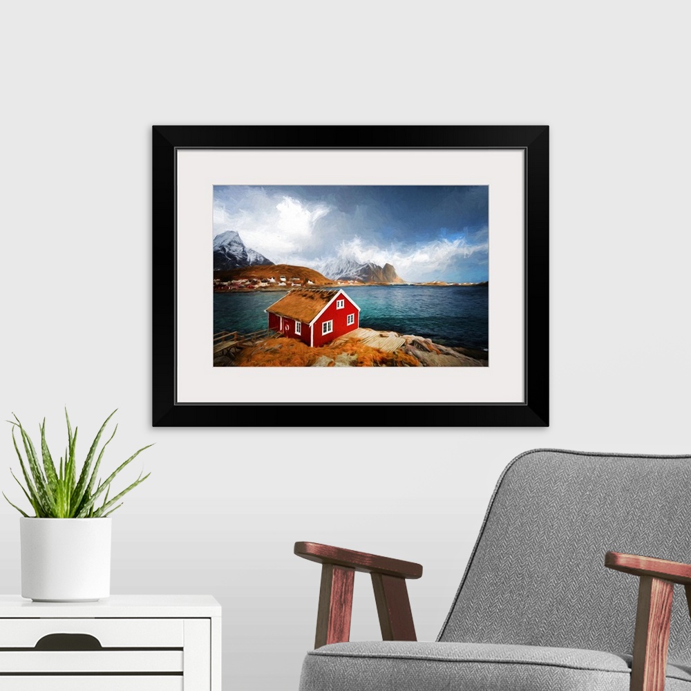 A modern room featuring A photograph of a red house with a rugged mountain covered in snow in the background.