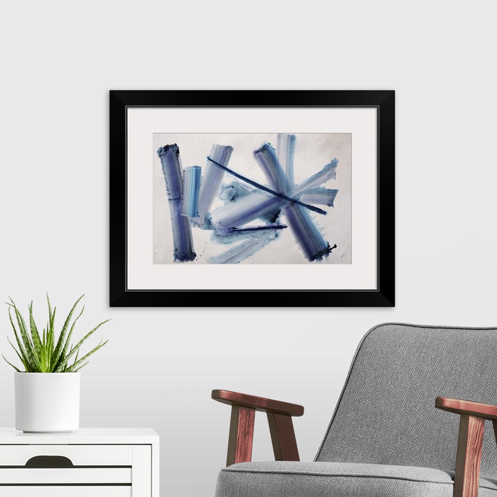 A modern room featuring An energetic blend of crossing strokes of blue and gray colors in the center of the artwork.