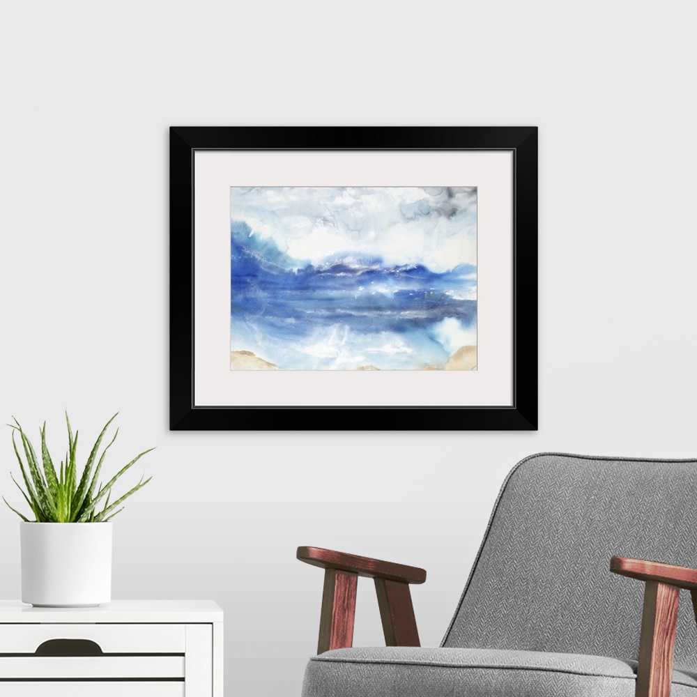 A modern room featuring Abstract landscape of a beach with a moody cloudy sky.