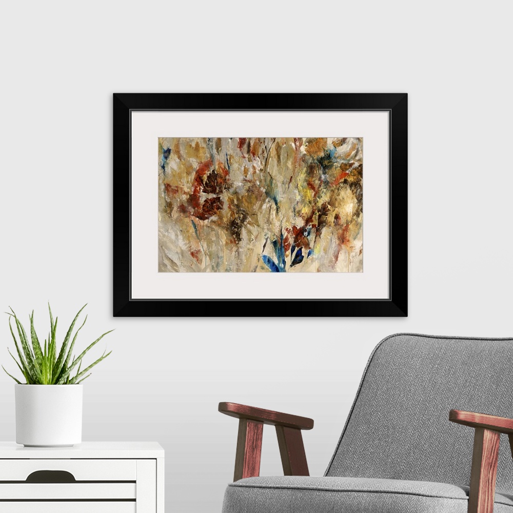 A modern room featuring Festive contemporary painting of flowers blooming in bright red, blue, and yellow.