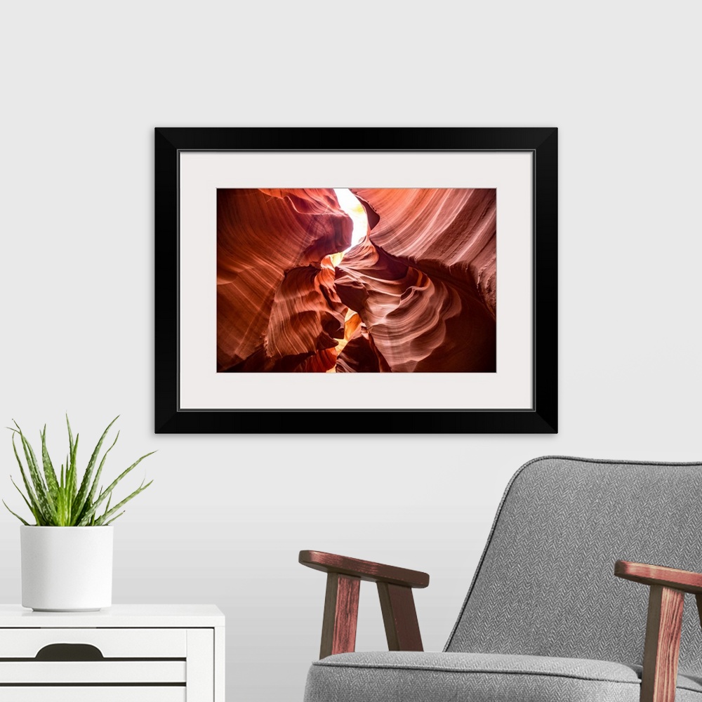 A modern room featuring Photograph from inside of Antelope Canyon's rock formation located on the Navajo Reservation in P...