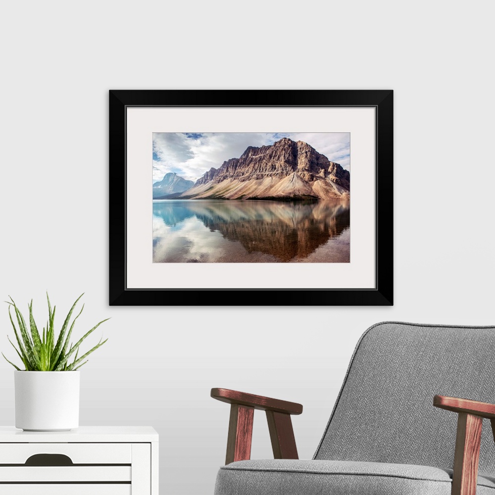 A modern room featuring Crowfoot Mountain reflected in Bow Lake located in Banff National Park, Alberta, Canada.