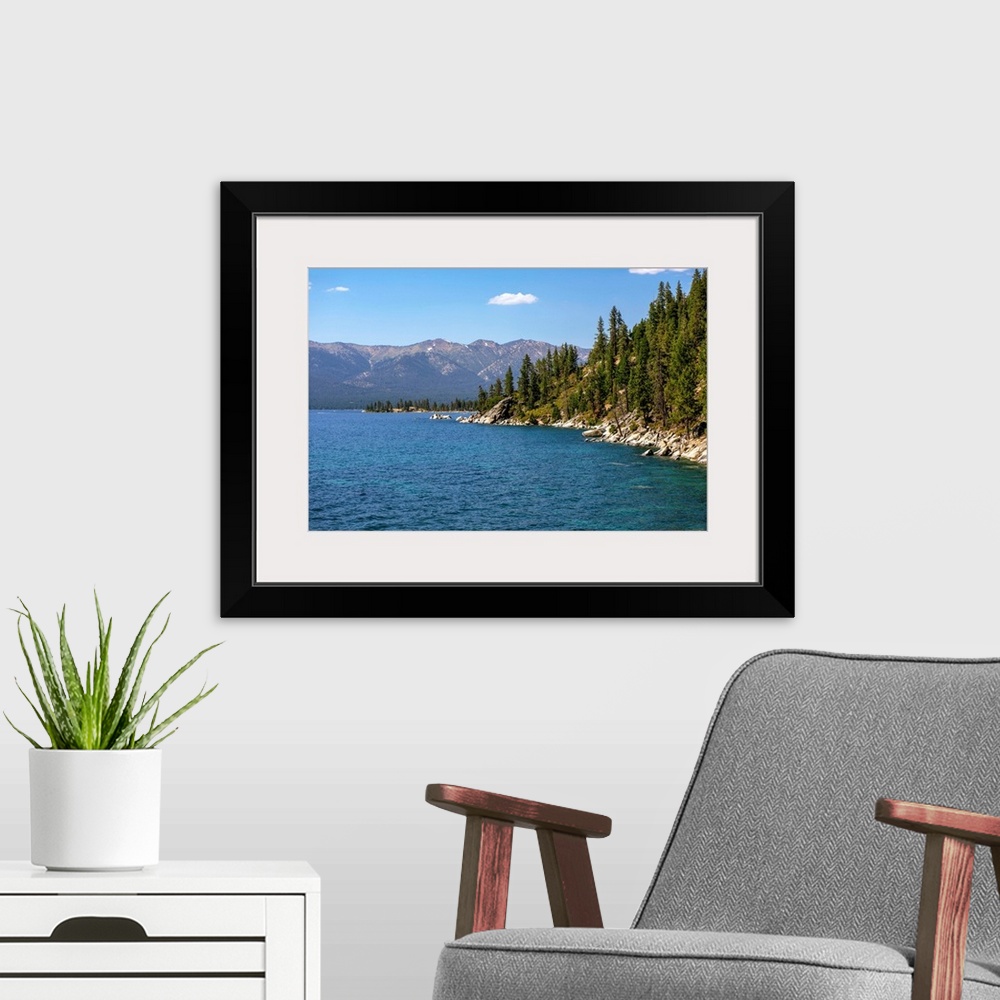 A modern room featuring View of eastern shore of Lake Tahoe in California and Nevada.