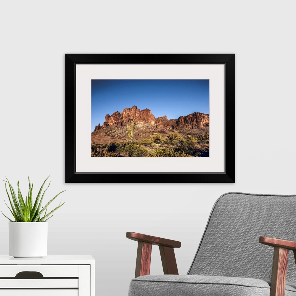 A modern room featuring Saguaro cactus and Superstition mountain in Phoenix, Arizona.
