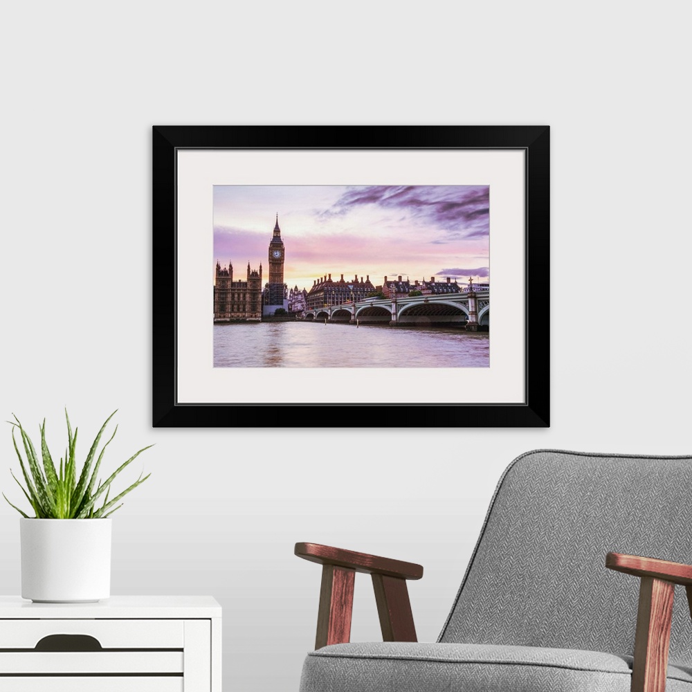 A modern room featuring Photograph of Big Ben and the Westminster Bridge with a pink and purple sunset.
