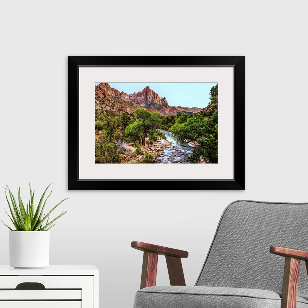 A modern room featuring Landscape photograph of Zion National Park with the Virgin River.