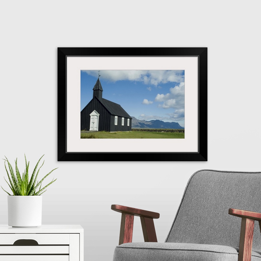 A modern room featuring Small local church, Budir, Iceland