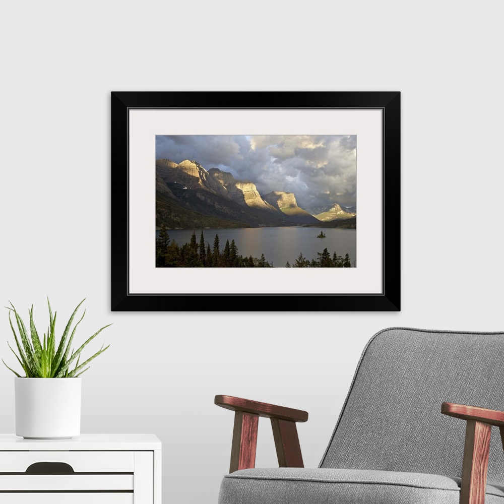 A modern room featuring St. Mary Lake and Wild Goose Island on a cloudy morning, Glacier National Park, Montana