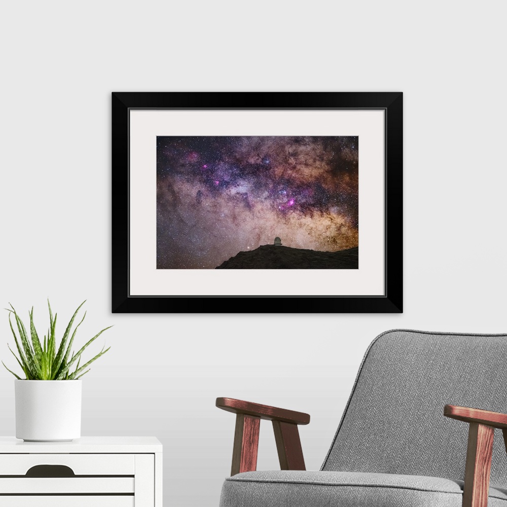 A modern room featuring Milky Way over the Nordic Optical Telescope (NOT) telescope, Roque de los Muchachos Observatory, ...