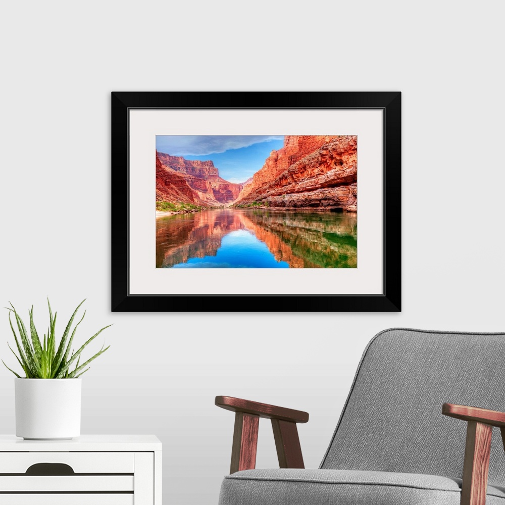 A modern room featuring Reflection of Grand Canyon in Colorado River.