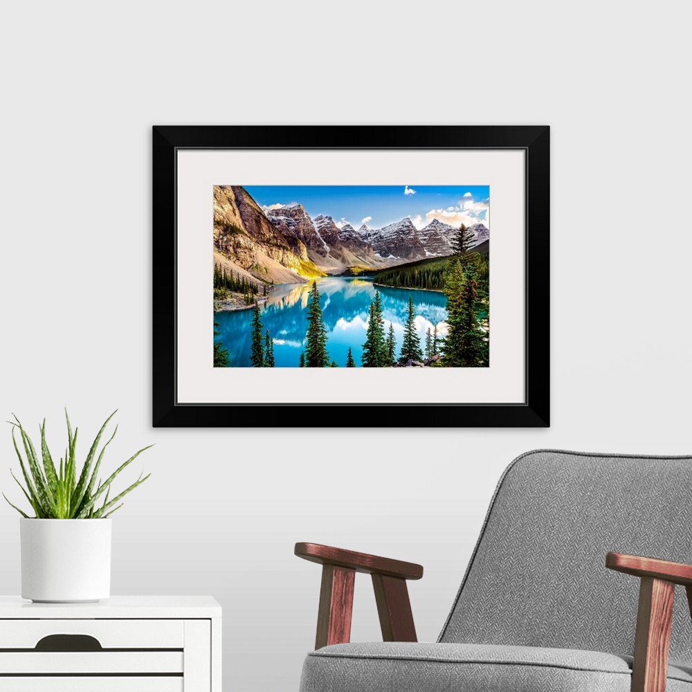 A modern room featuring Landscape sunset view of Morain lake and mountain range Alberta, Canada.