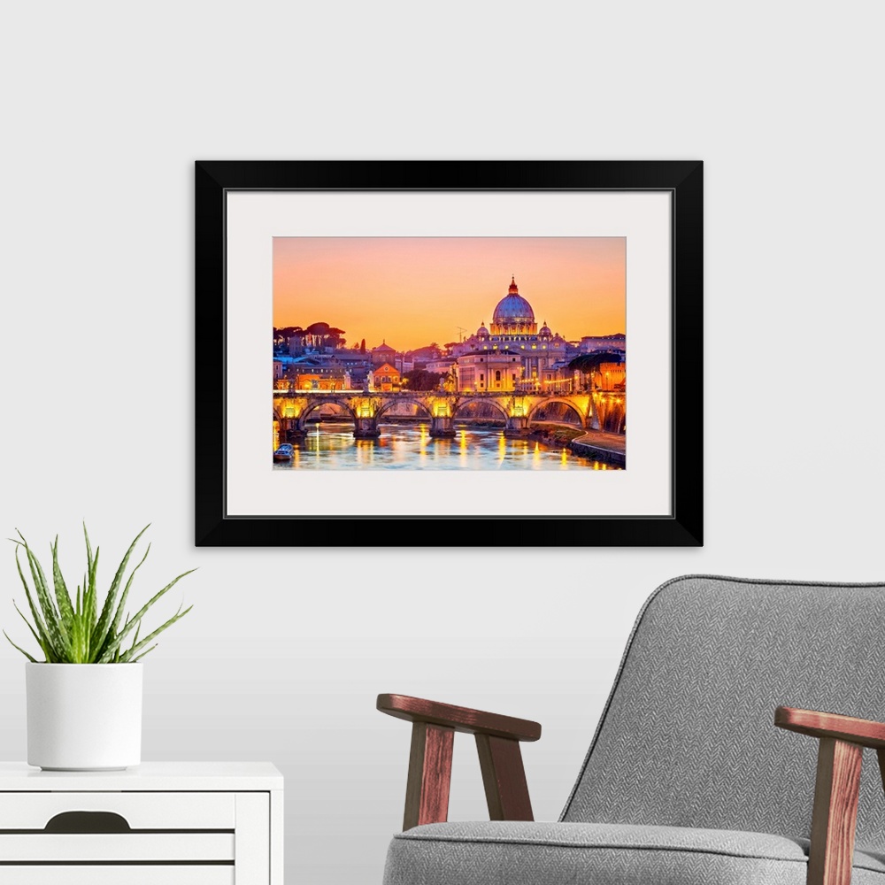 A modern room featuring Night view of St. Peter's Cathedral in Rome, Italy
