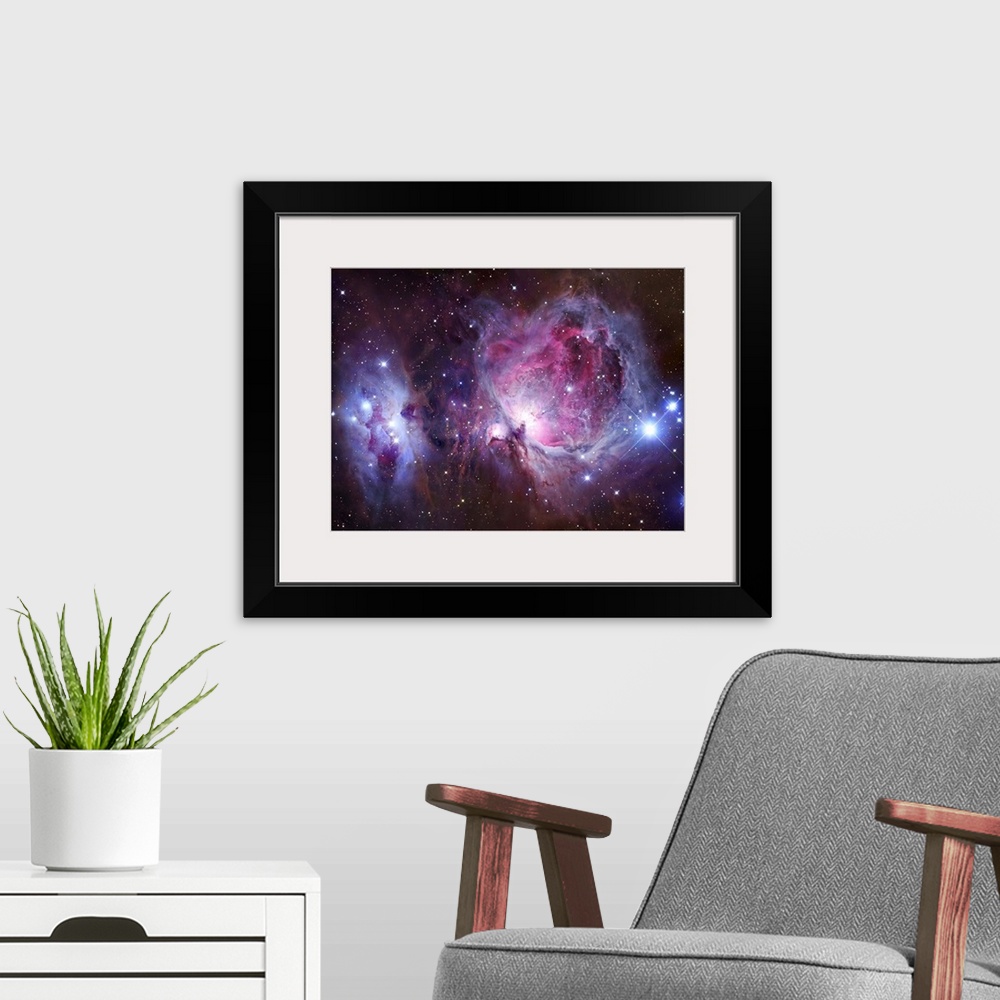 A modern room featuring M42, the Orion Nebula (top), and NGC 1977, a reflection nebula (bottom).