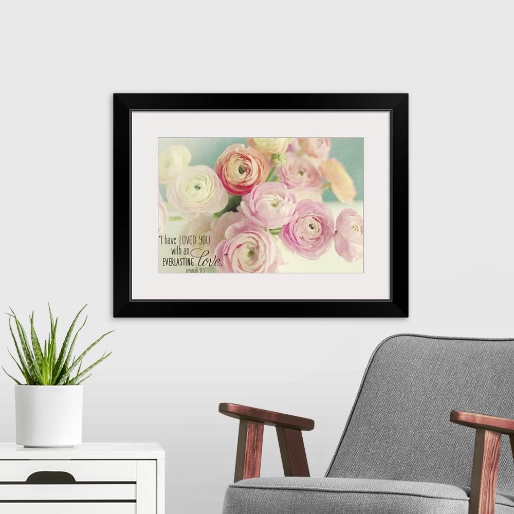 A modern room featuring Pastel-toned image of pink flowers with a Bible verse.