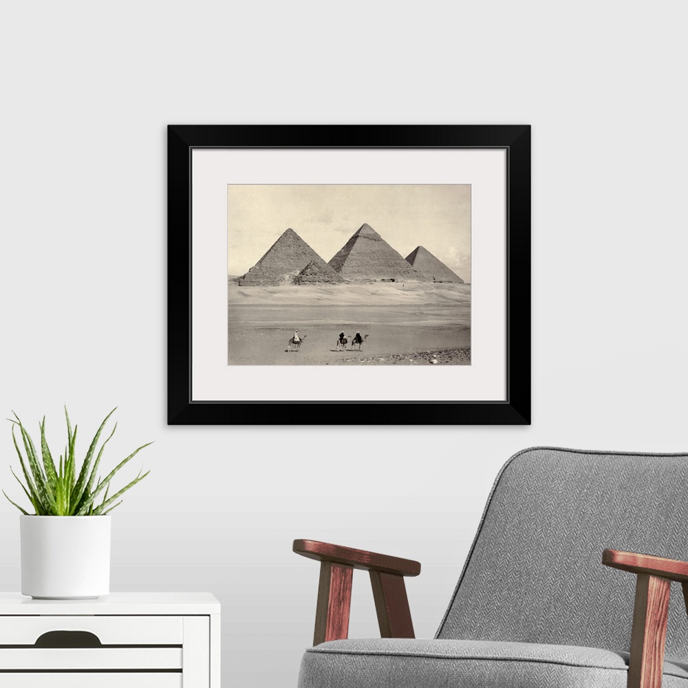 A modern room featuring Egypt, Pyramids At Giza. the Pyramids At Giza, Egypt, With three Travelers In the Foreground. Pho...