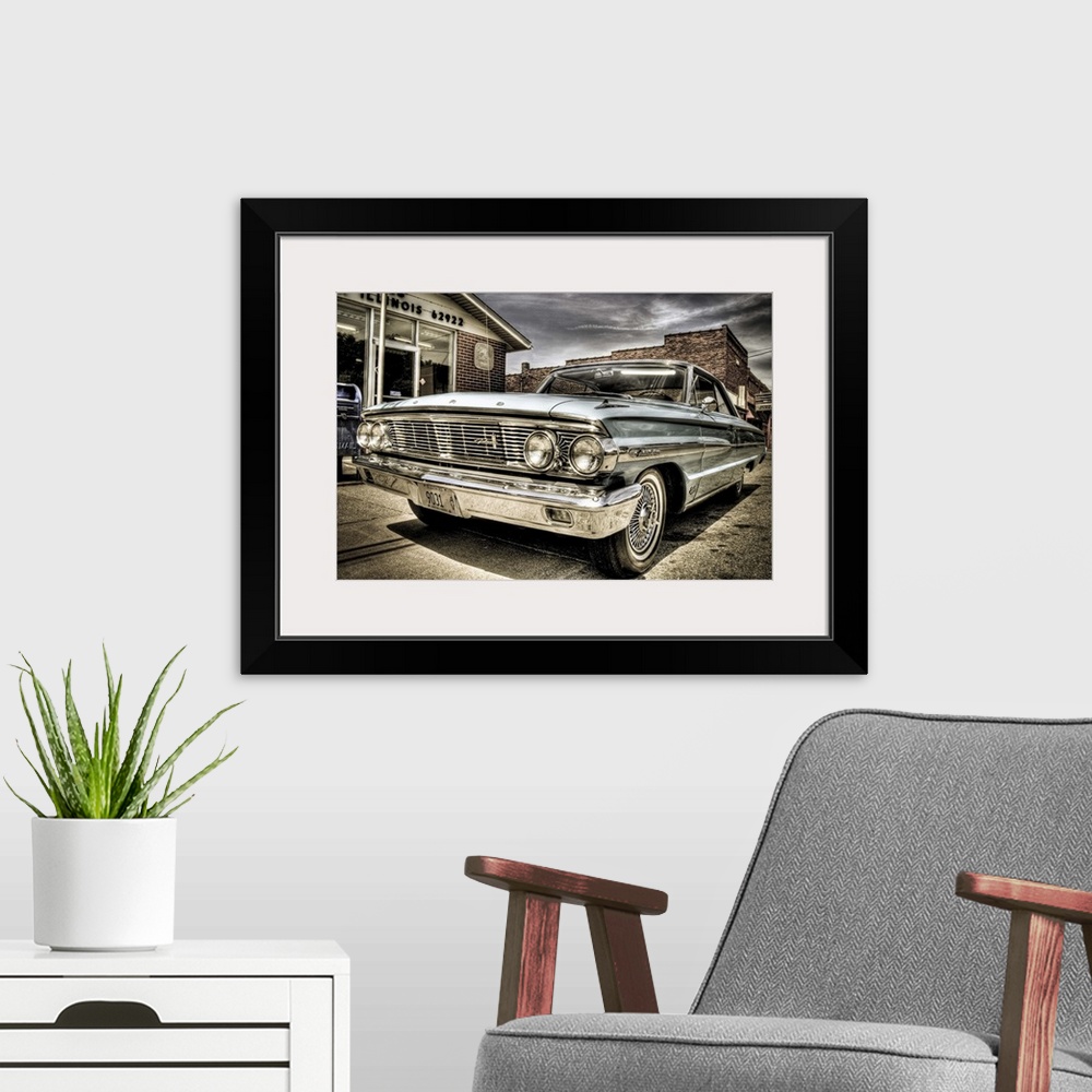 A modern room featuring A 1960's Ford Galaxy car