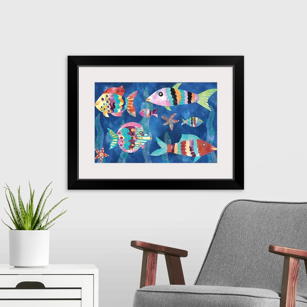 A modern room featuring A collage of colorful fish and starfish with seaweed in the background made from mixed media.
