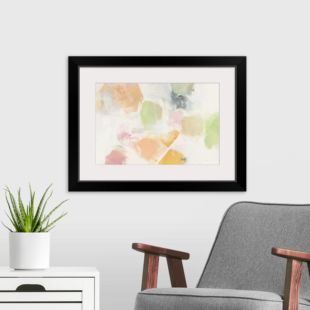 A modern room featuring Large abstract art with soft blotches of green, pink, orange, and yellow hues on a grey and white...