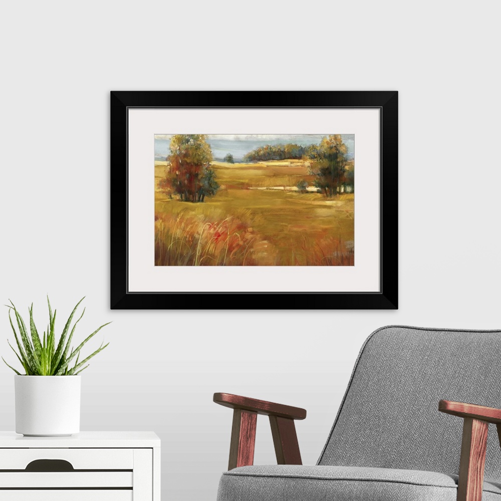 A modern room featuring Contemporary landscape painting of a grassy meadow dotted with trees in the late afternoon in the...