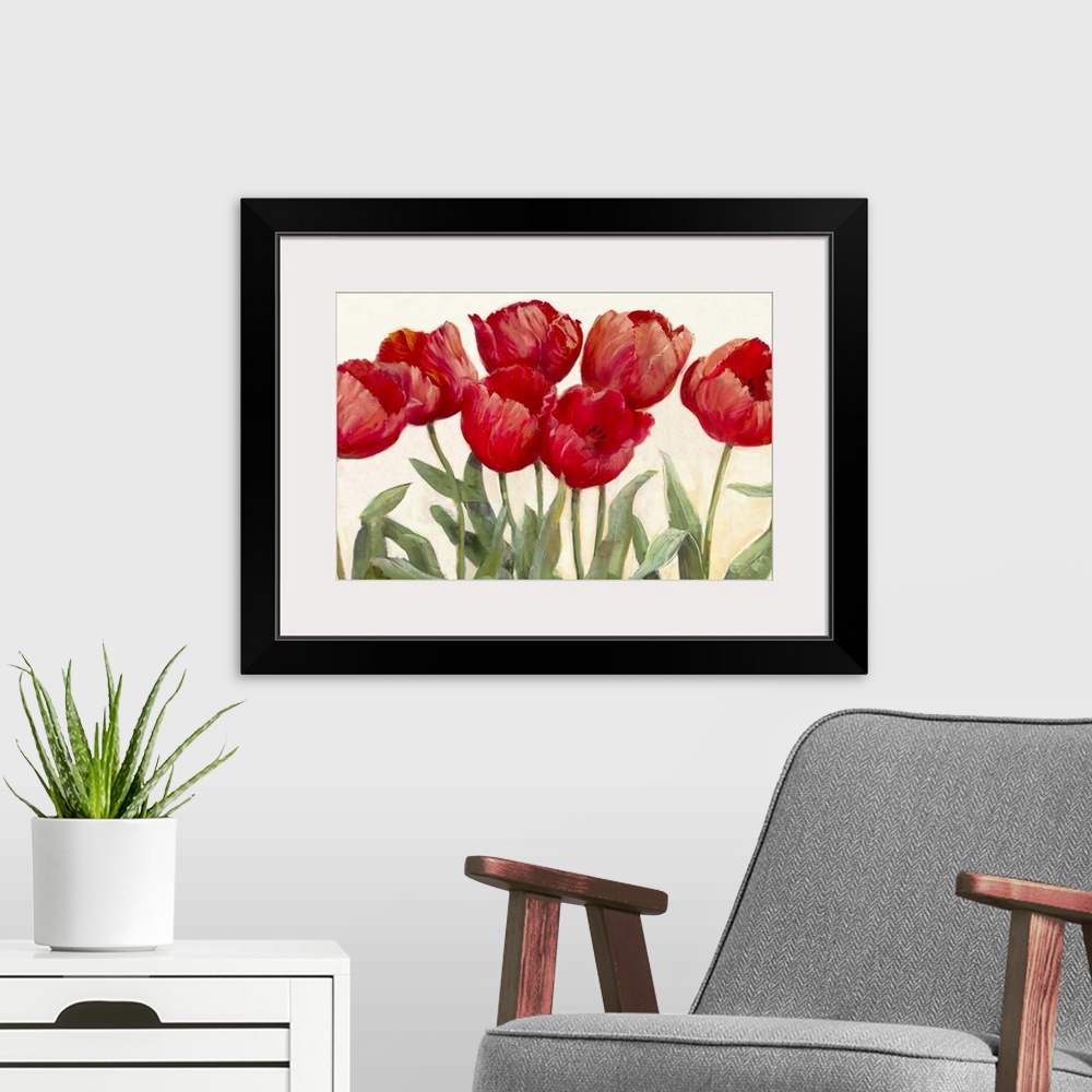A modern room featuring Large floral art focuses on seven flowers as they sit against a bare background.