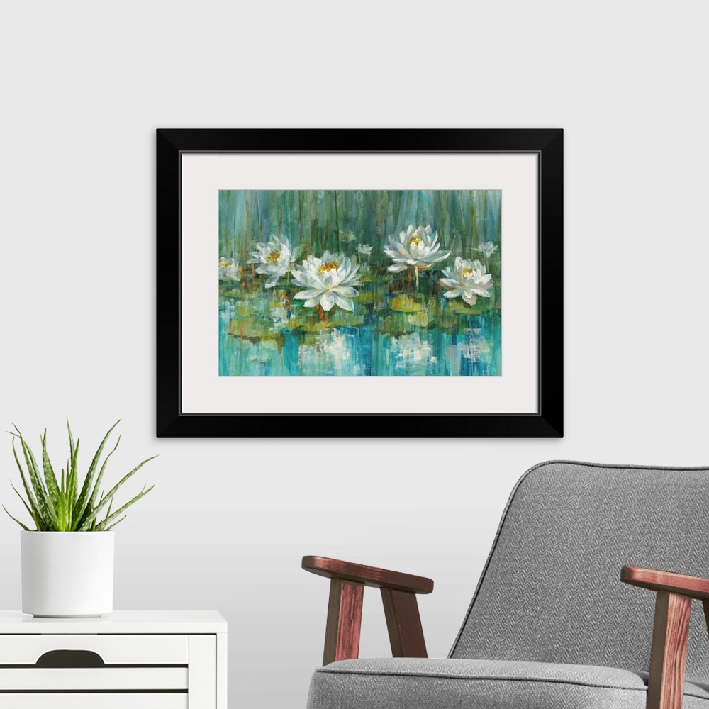 A modern room featuring Contemporary abstract painting of water lilies in a pond with beautiful blue and green hues.