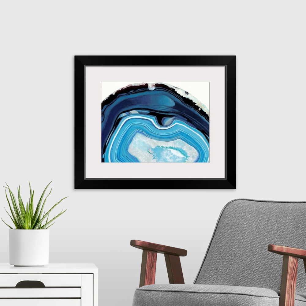 A modern room featuring Contemporary painting of a cross section of mineral agate in bright blue.