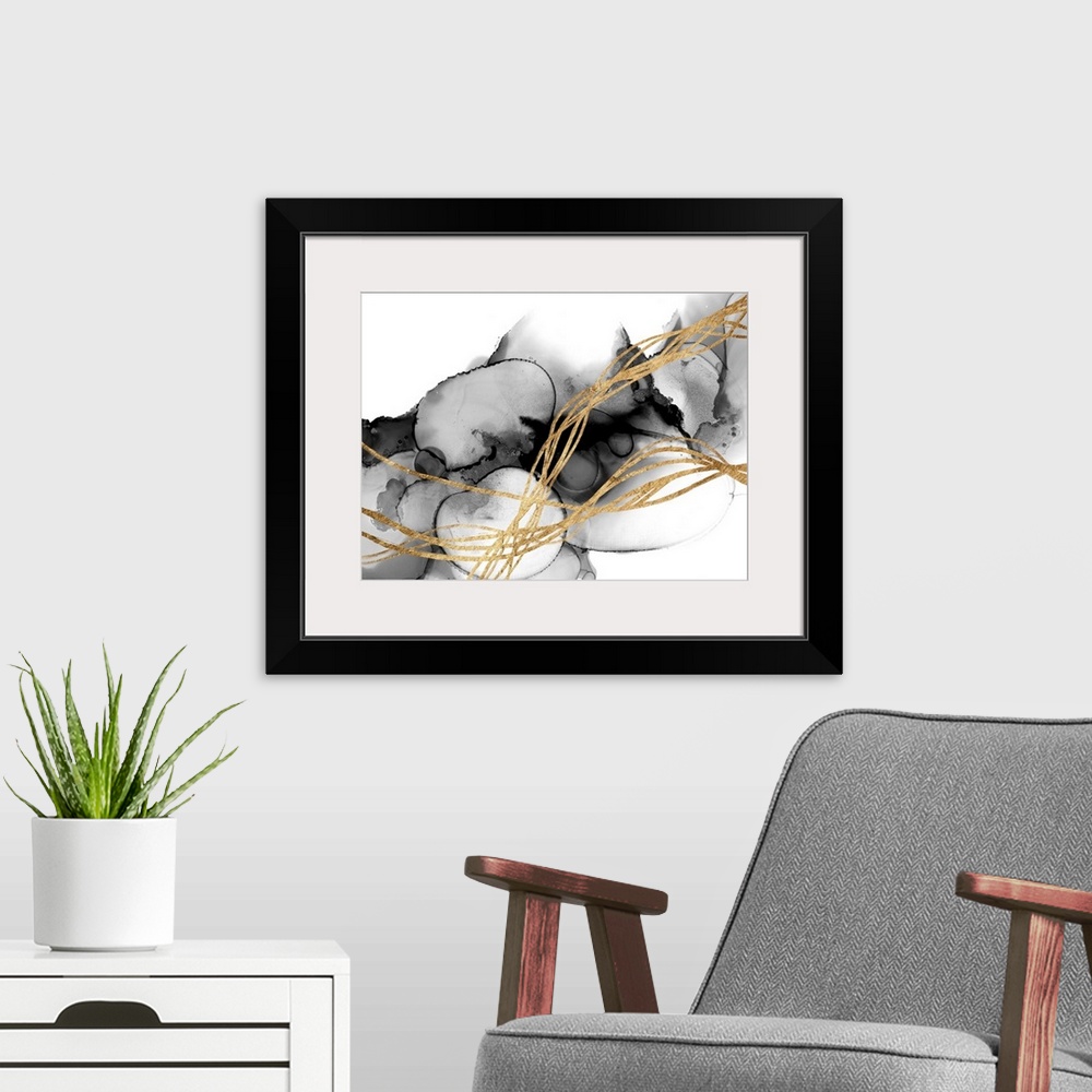 A modern room featuring A stunning abstract piece featuring waves of gold atop a smoky, inky, fluid background. The combi...