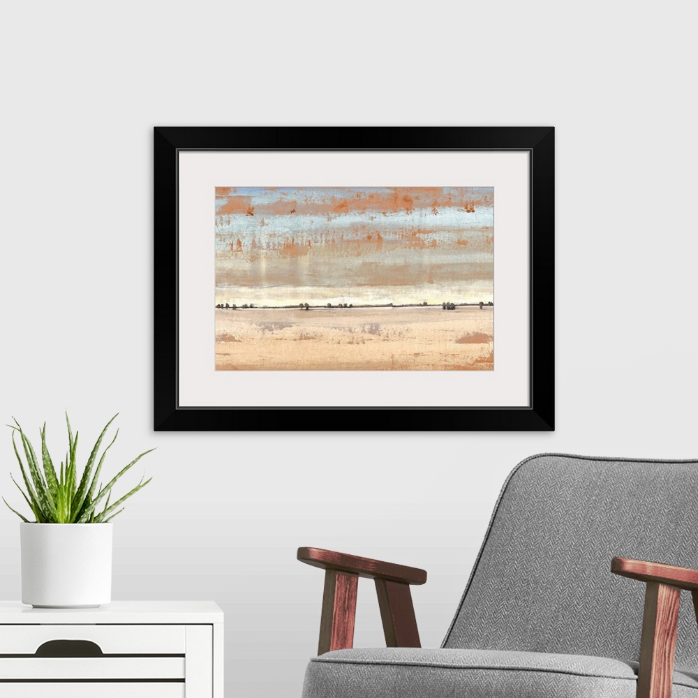 A modern room featuring Abstract landscape of an open desert under a pale sky.
