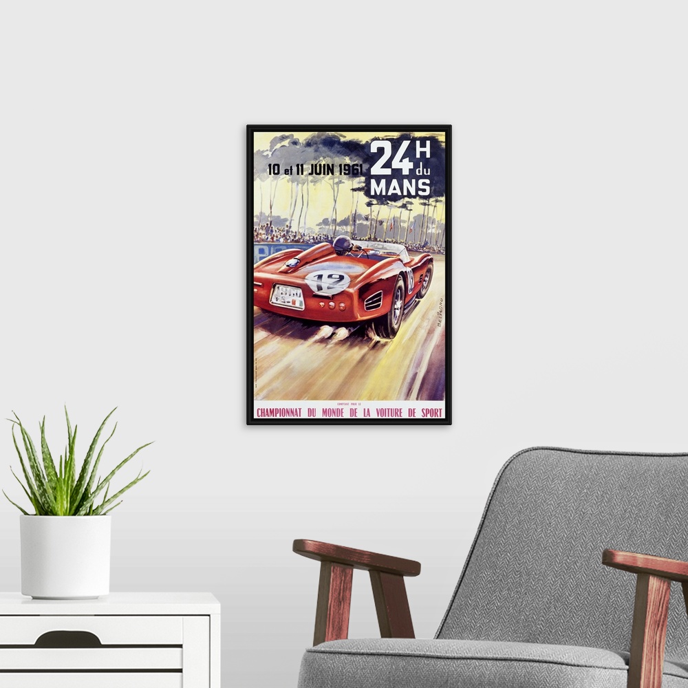 A modern room featuring Giant antique advertising art for a car racing world championship showcases an automobile driving...