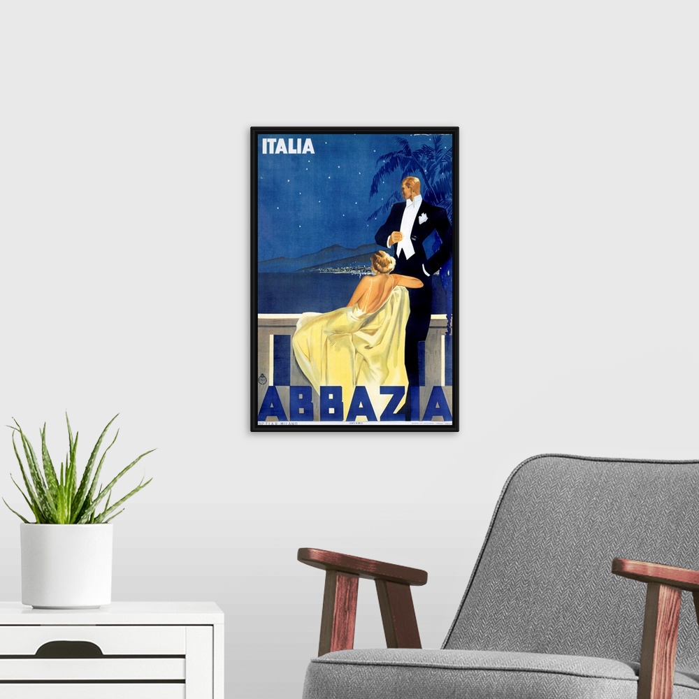 A modern room featuring Antique advertising poster showcasing hotel in Venice.  A woman dressed in an evening gown and a ...