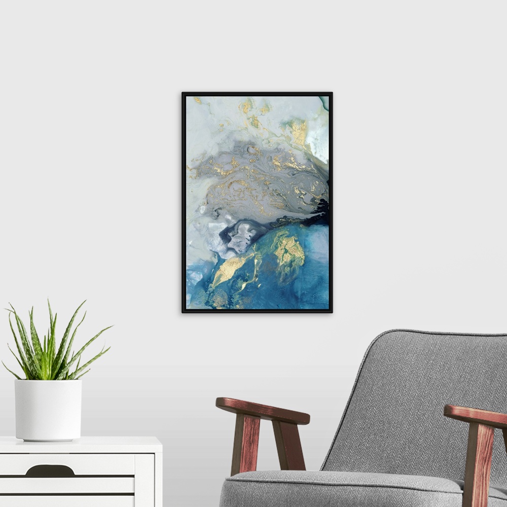 A modern room featuring Abstract painting in blue and gold, resembling swirling waves.
