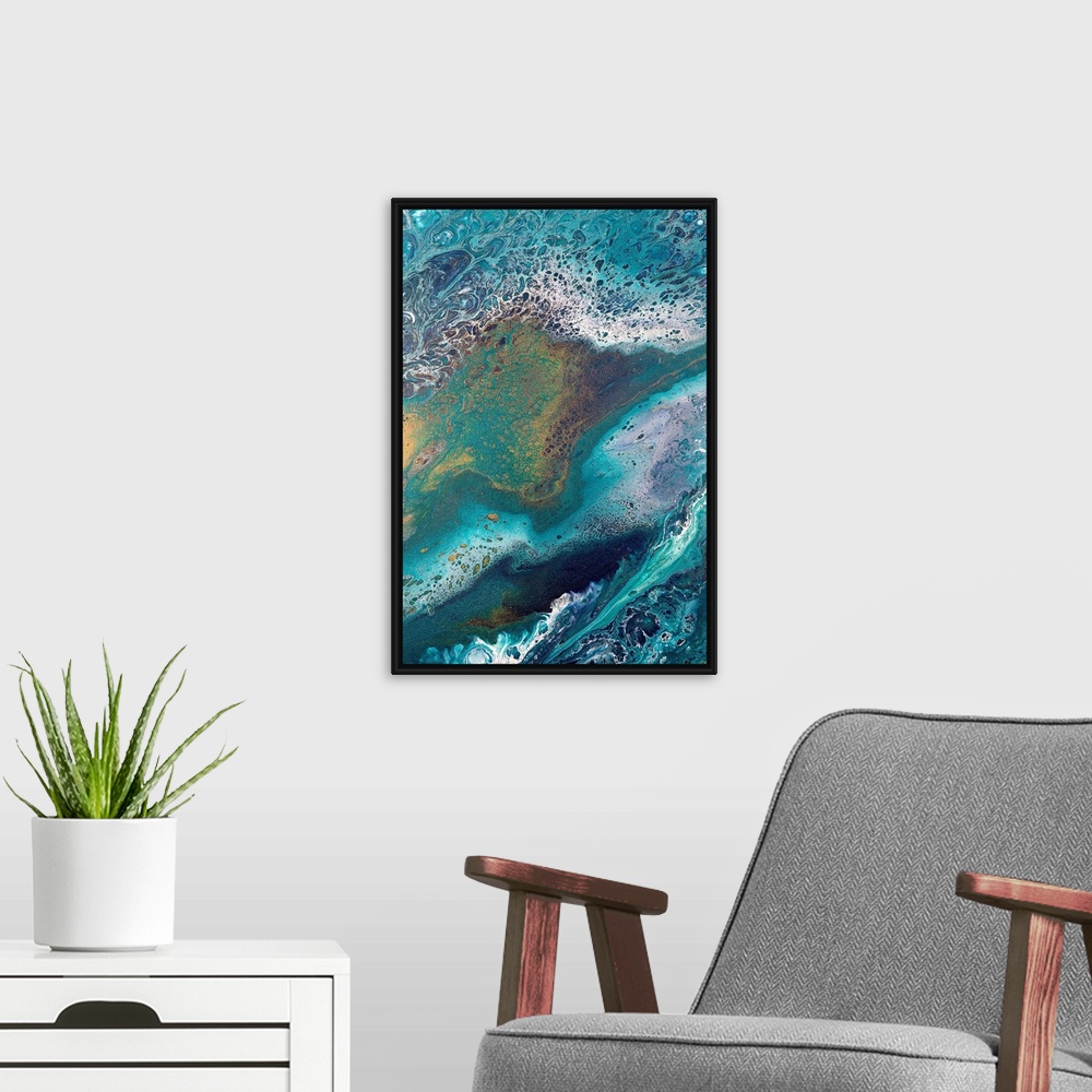 A modern room featuring Abstract contemporary painting in color tones resembling the ocean, applied in a marbling effect.