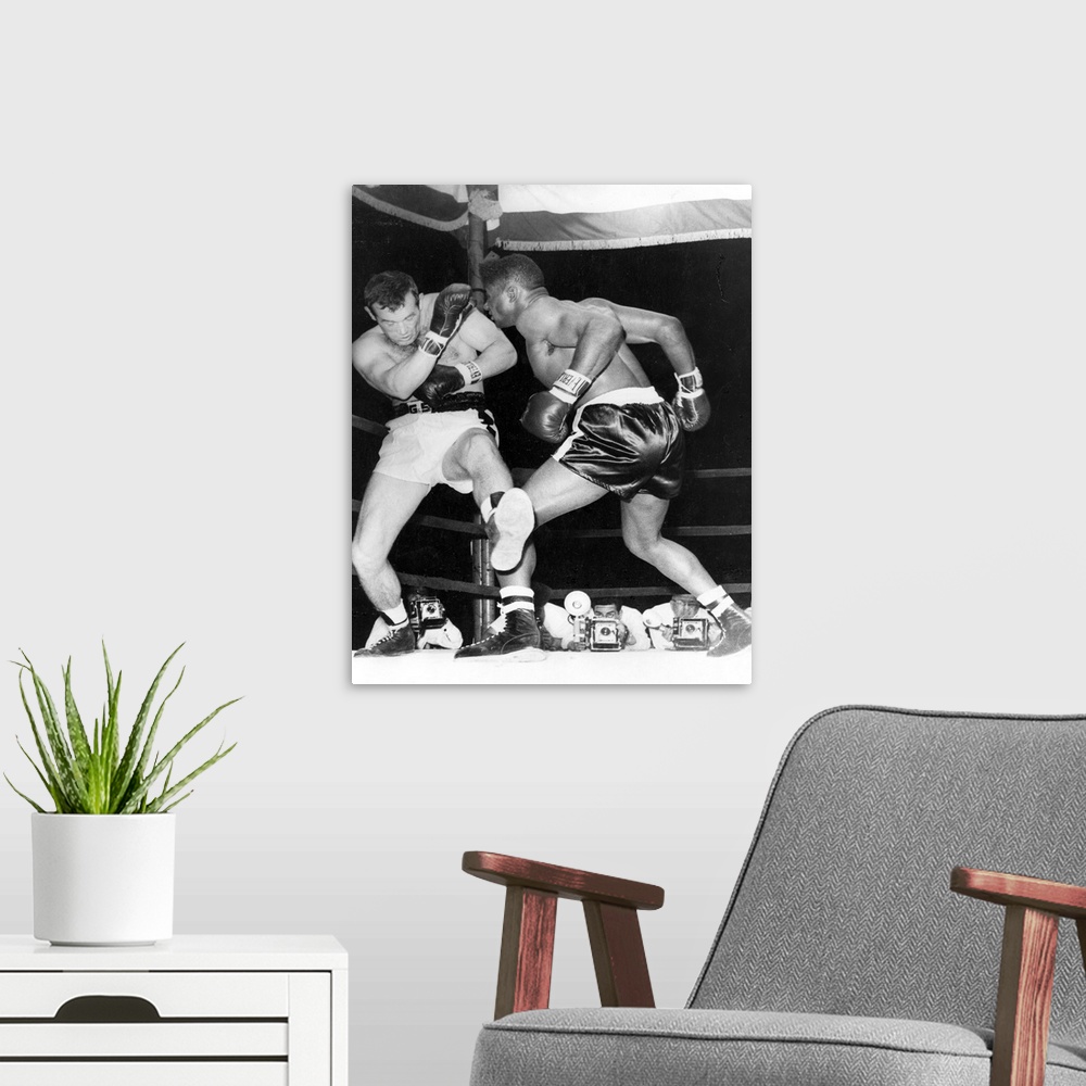A modern room featuring Floyd Patterson of the USA, fighting Ingemar Johansson of Sweden in New York