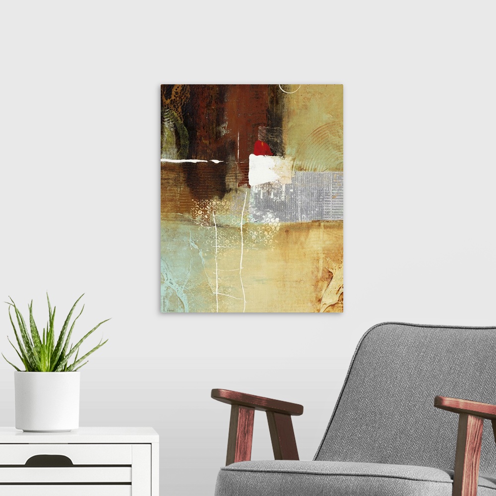 A modern room featuring Contemporary abstract artwork using warm and cool tones mixed different textures and shapes.