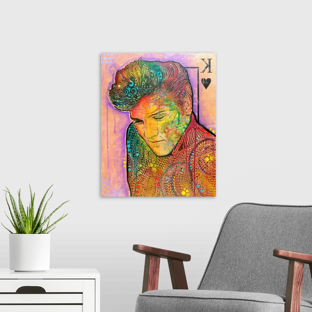 A modern room featuring Pop art style illustration of Elvis on the King of Hearts playing card with various colors and de...