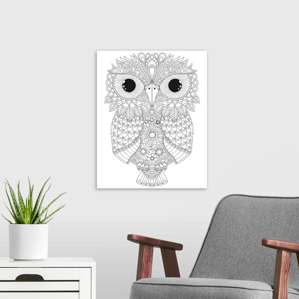 A modern room featuring Black and white line art of an intricately designed owl with big eyes.