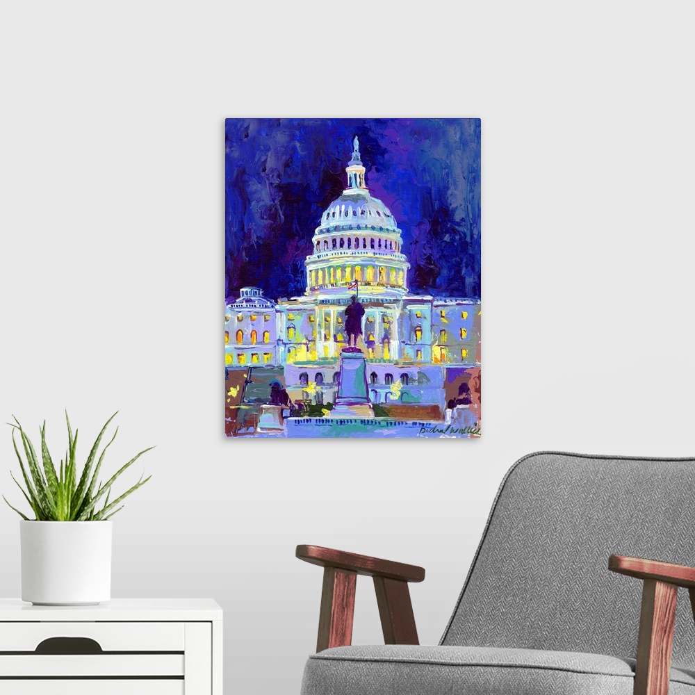 A modern room featuring Painting of the nations capitol building lit up at night.
