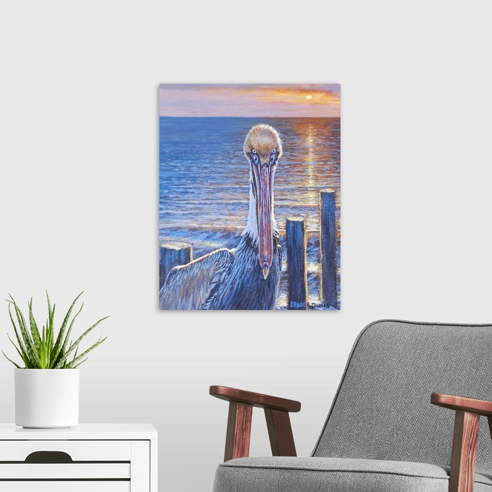 A modern room featuring Contemporary painting of a pelican on the beach at sunset, next to some wooden posts.