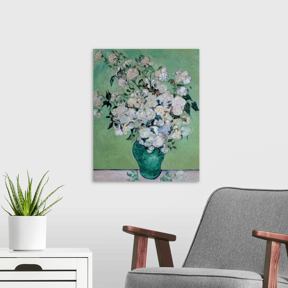 A modern room featuring Painting on canvas of flowers in a vase with a few petals on the table it is sitting on.