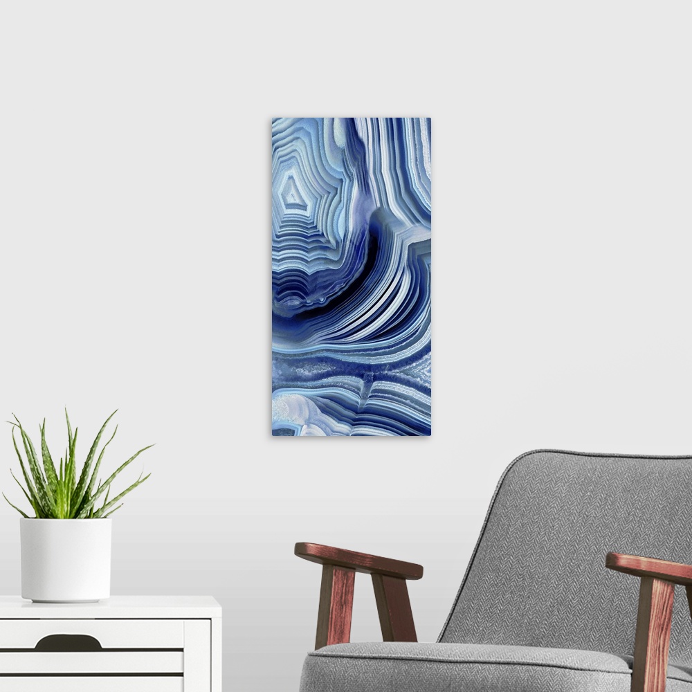 A modern room featuring Tall panel abstract art with an agate pattern in shades of blue and gray.