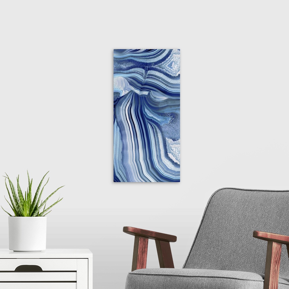 A modern room featuring Tall panel abstract art with an agate pattern in shades of blue and gray.