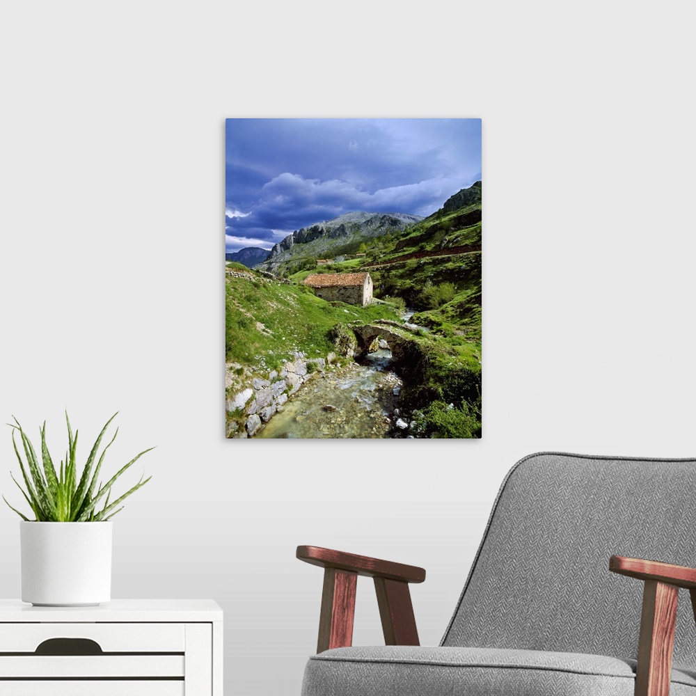 A modern room featuring Spain, Asturias, Picos de Europa National Park, Sotres, Landscape near the village